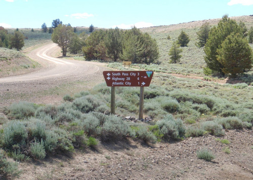 Sign for GDMBR Main Route and Alternate Route, near Atlantic City, WY.